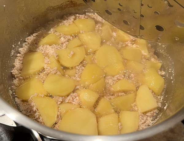 patate cotte con macinato di pollo